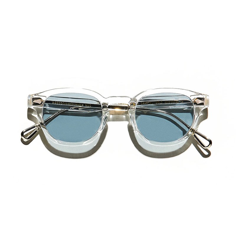 Lunettes Moscot Lemtosh TT SE Sun en Crystal/Gold taille 46 Average avec monture transparente et détails dorés.